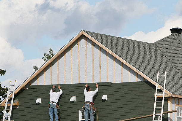 Professional Vinyl Siding technician working in Townville, PA